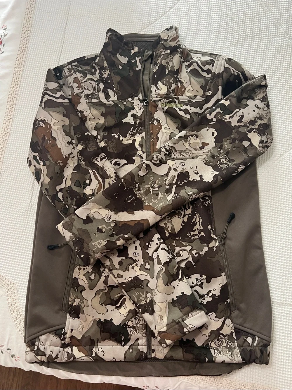 Magellan Outdoors camouflage utility